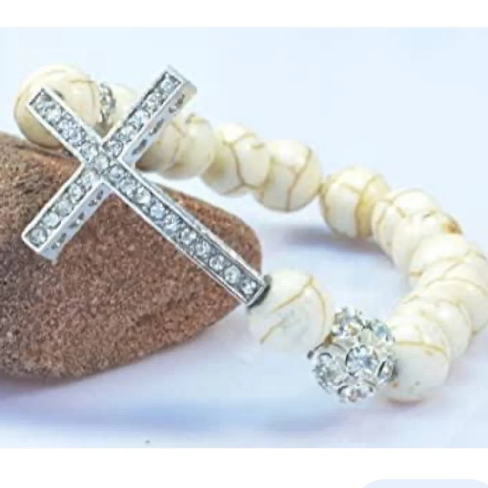 - New crystal cross stretch bracelet peach os